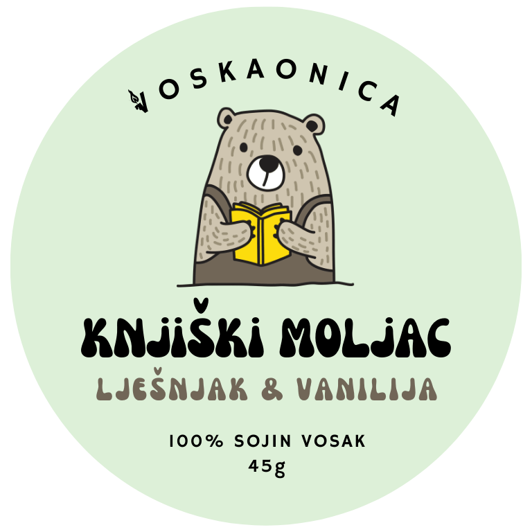 Medvjed koji čita knjigu uz mirisni vosak.