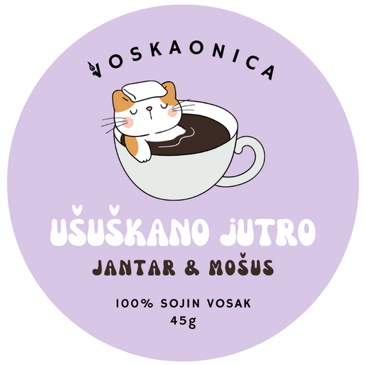 Macka u salici kave poziva na buđenje i uživanje u novom danu. Predstavlja mirisni vosak ususkano jutro.